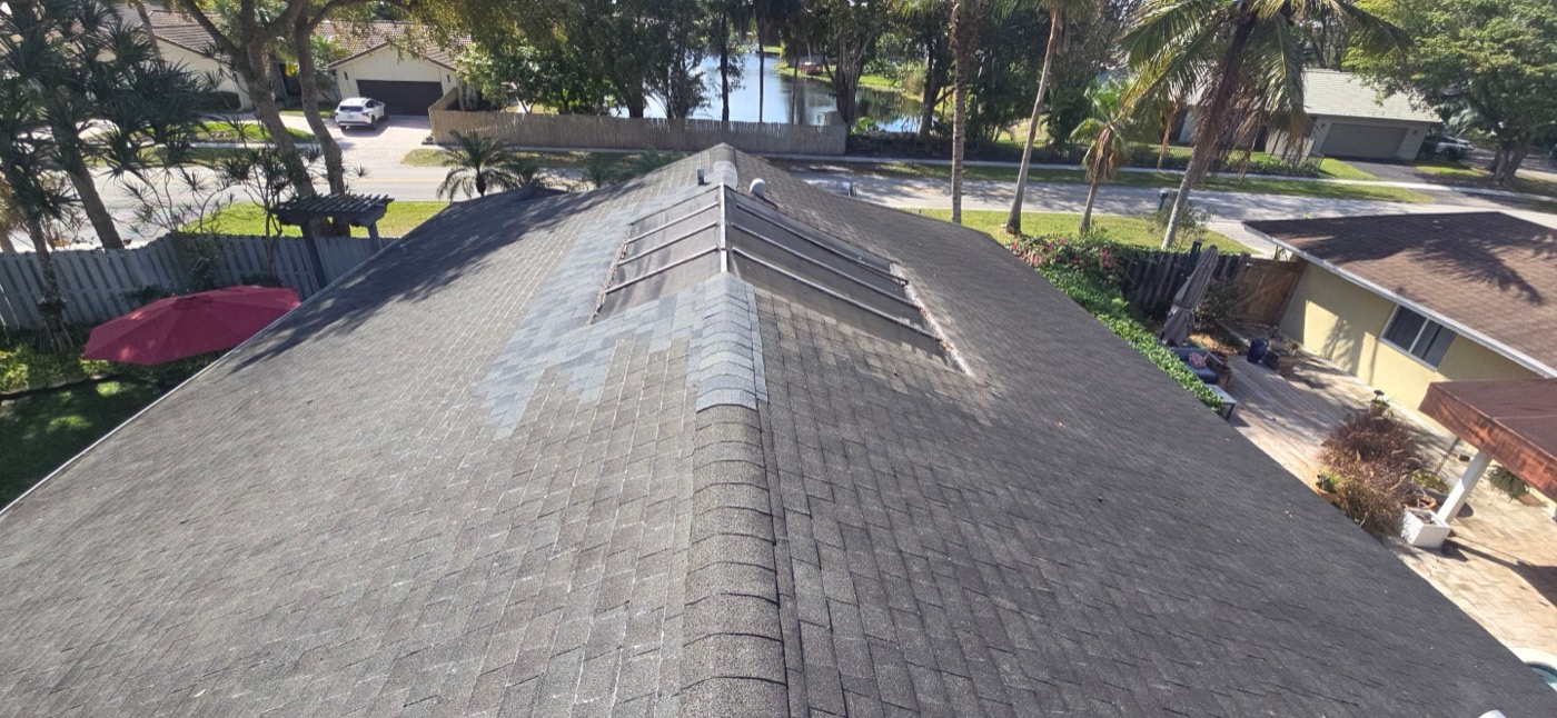 Weathered residential roof before renovation, Miami-Dade